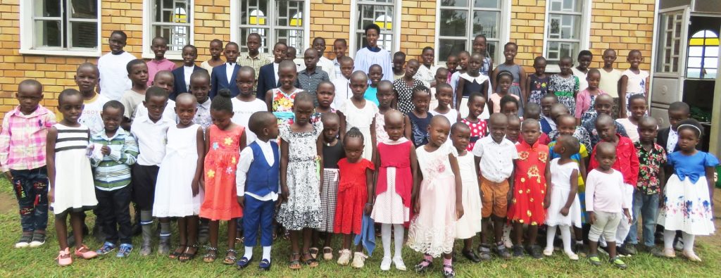 Kanansi Hope Nyangyezi with Sunday school pupils.
