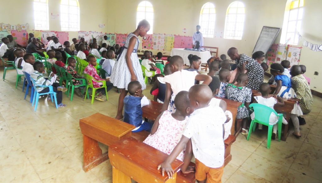 Kanansi Hope Nyangyezi leading a Sunday school service inside Can. Rujoki Children’s Church
